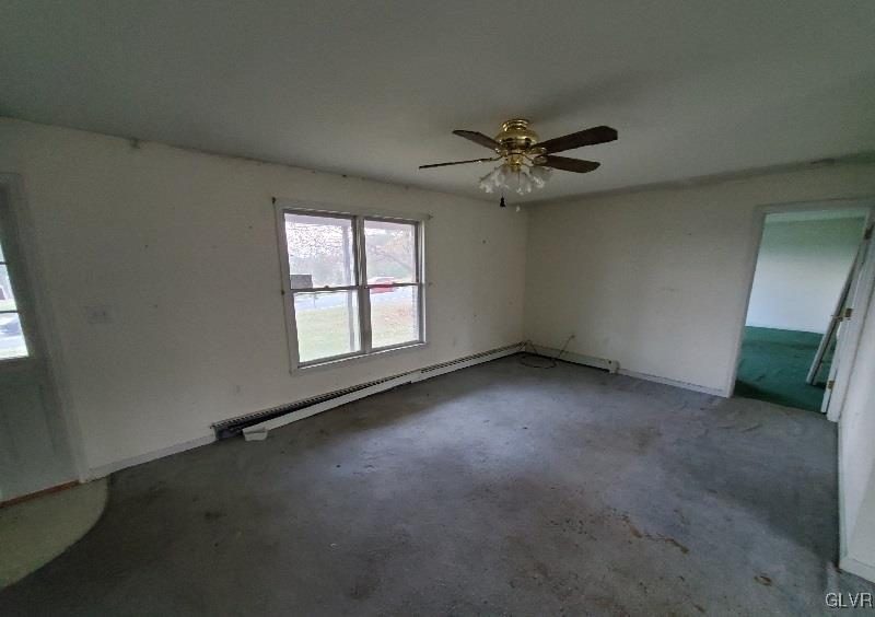 5535 Cetronia Road Allentown, PA 18104 - Photo 6 of 15 an empty room with windows and fan