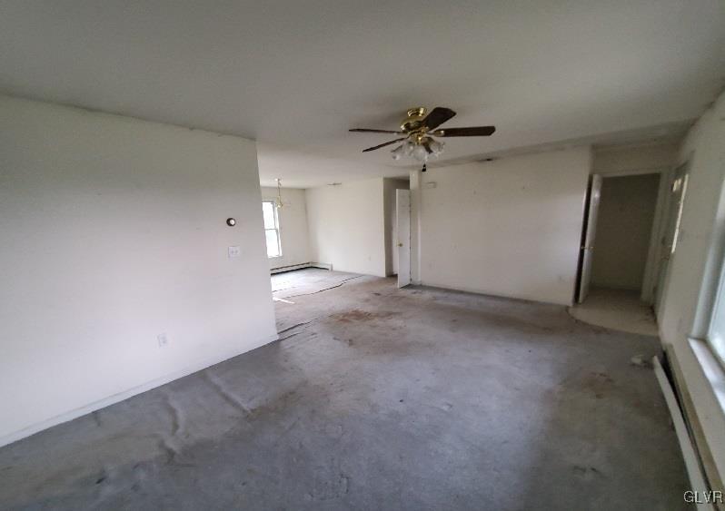 5535 Cetronia Road Allentown, PA 18104 - Photo 7 of 15 an empty room with a empty space and a ceiling fan