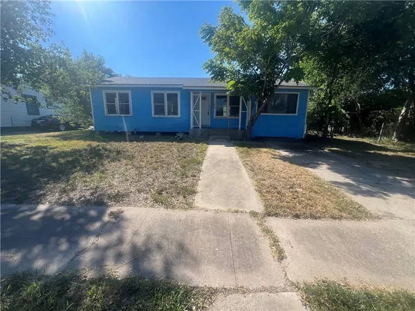 a view of a backyard with a garden