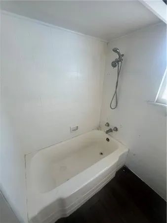 a bathroom with a bathtub