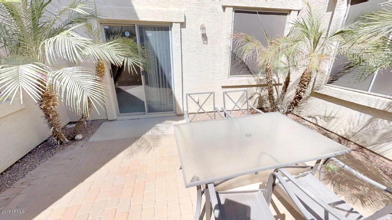 10419 West Trumbull Road Tolleson, AZ 85353 - Photo 13 of 14 Courtyard Off Dining Room