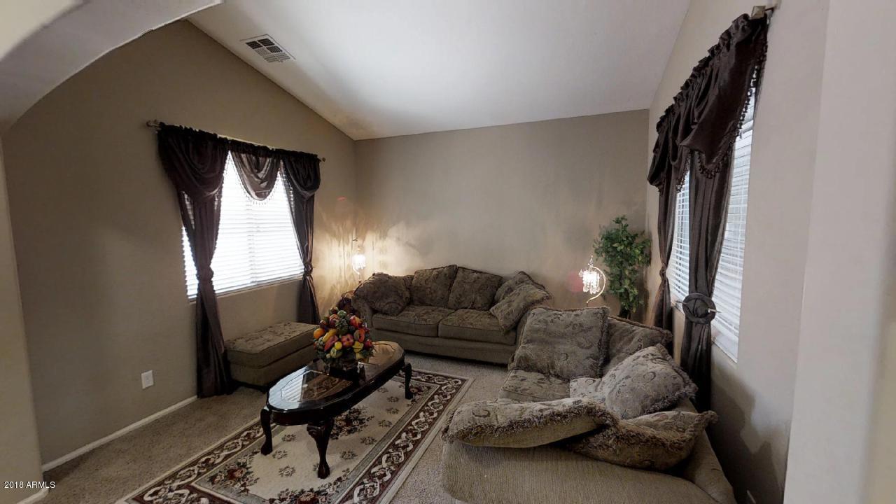 10419 West Trumbull Road Tolleson, AZ 85353 - Photo 2 of 14 Living Room