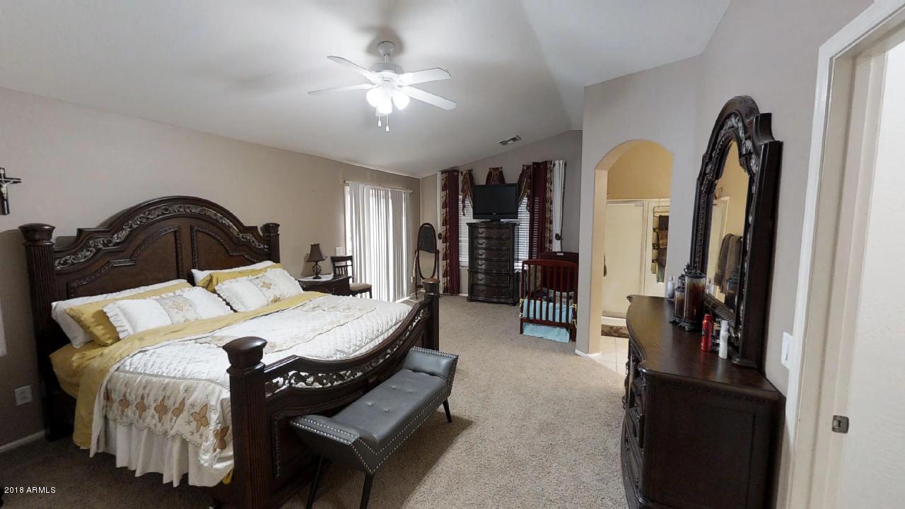 10419 West Trumbull Road Tolleson, AZ 85353 - Photo 9 of 14 Master Bedroom