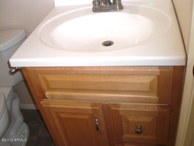 5647 West Hatcher Road Glendale, AZ 85302 - Photo 24 of 44 023-357726 bath 2 sink and cabinet