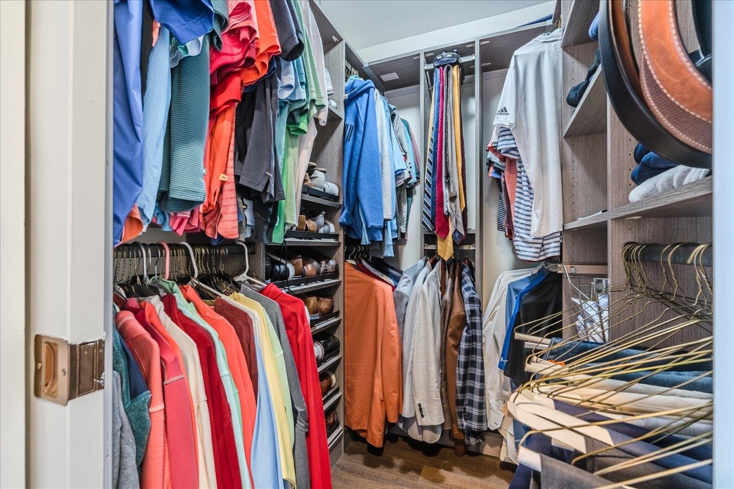 200 Wagner Place, Unit 706 Memphis, TN 38103 - Photo 15 of 32 a view of walk in closet with clothes