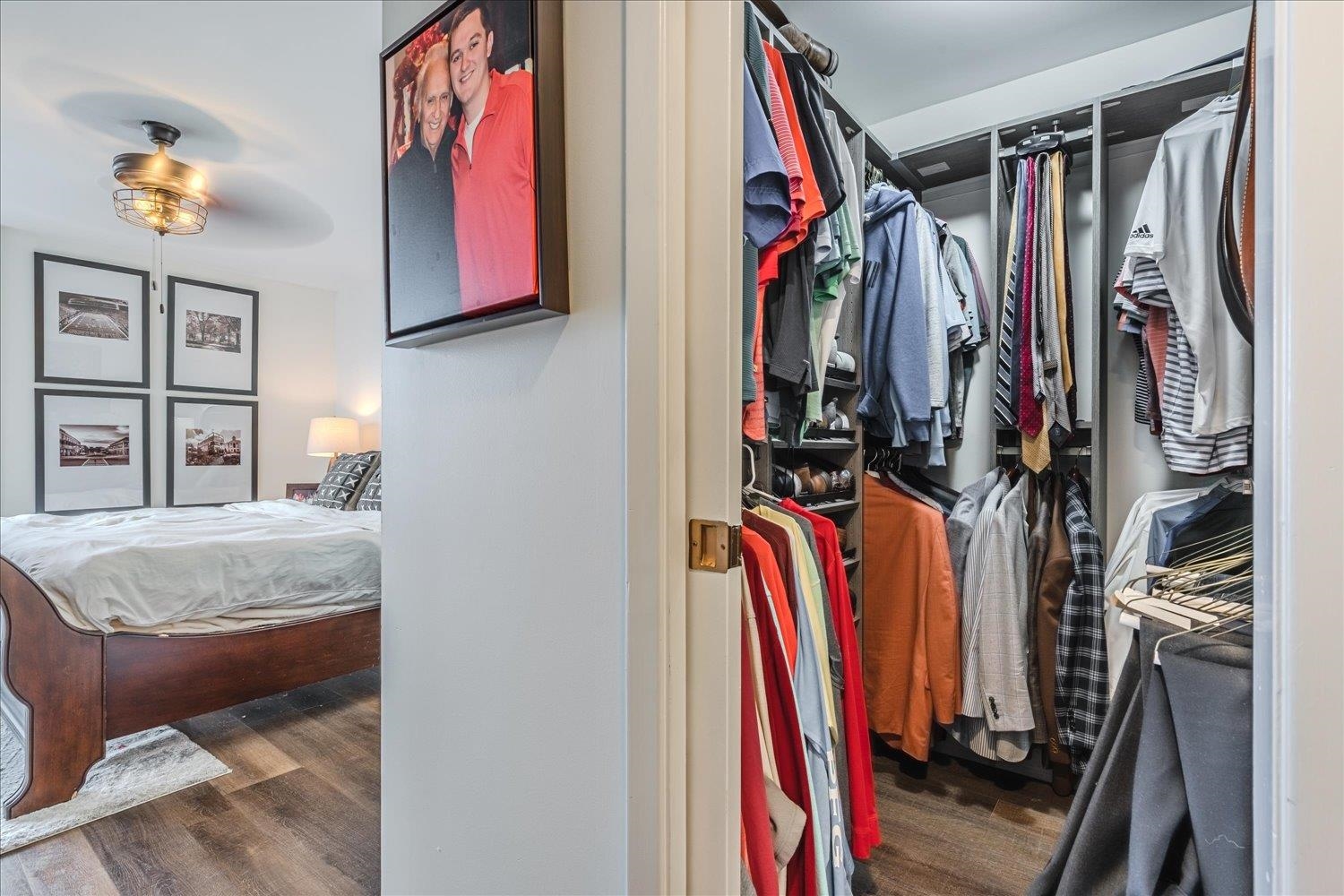 200 Wagner Place, Unit 706 Memphis, TN 38103 - Photo 16 of 32 a view of walk in closet with clothes and shoes