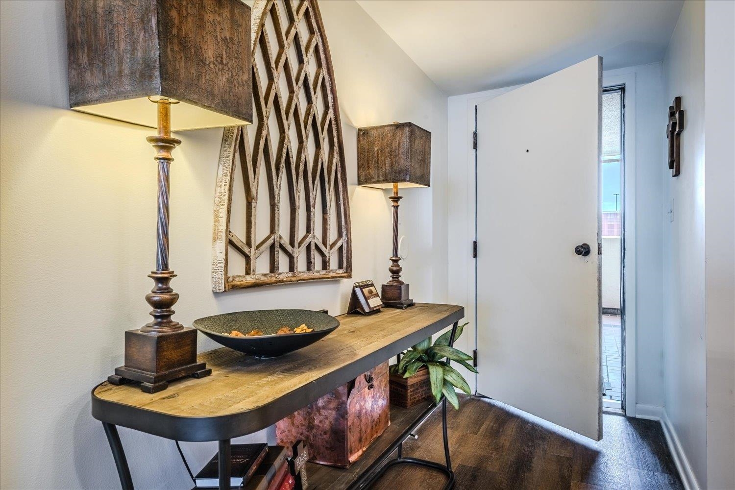 200 Wagner Place, Unit 706 Memphis, TN 38103 - Photo 3 of 32 a dining room with furniture and wooden floor