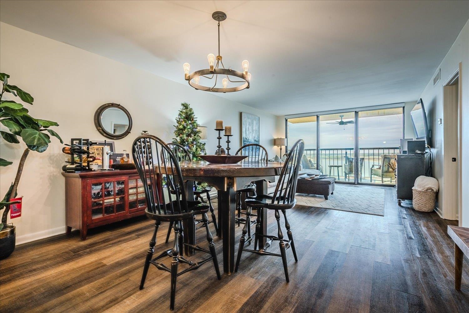 200 Wagner Place, Unit 706 Memphis, TN 38103 - Photo 9 of 32 a view of a dining room with furniture window and wooden floor