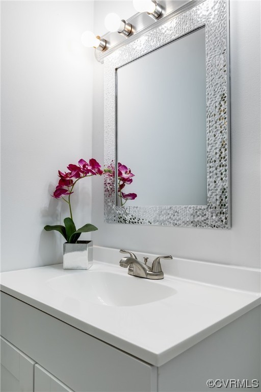 2655 Ridge Road Powhatan, VA 23139 - Photo 11 of 25 a bathroom with a sink and a mirror