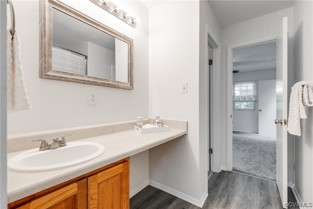 2655 Ridge Road Powhatan, VA 23139 - Photo 15 of 25 a bathroom with a sink and a mirror