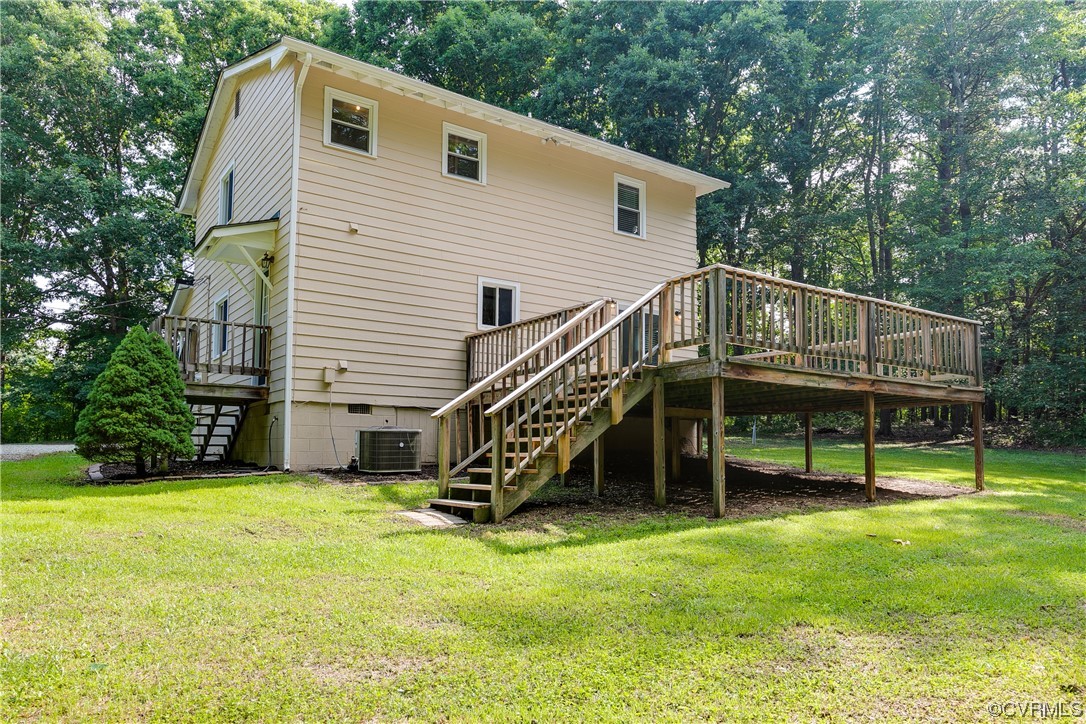 2655 Ridge Road Powhatan, VA 23139 - Photo 22 of 25 a view of a house with a backyard
