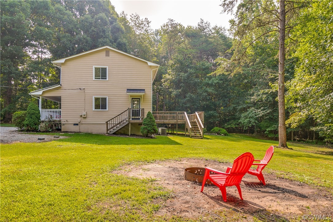 2655 Ridge Road Powhatan, VA 23139 - Photo 24 of 25 a view of a house with swimming pool and sitting area
