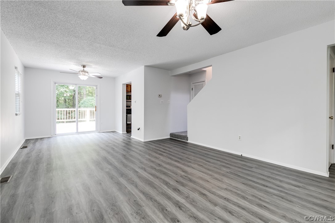 2655 Ridge Road Powhatan, VA 23139 - Photo 5 of 25 wooden floor in an empty room with a window