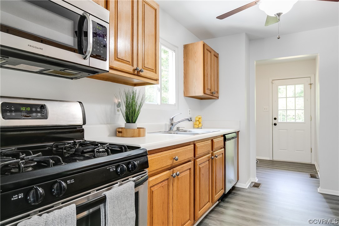 2655 Ridge Road Powhatan, VA 23139 - Photo 7 of 25 a kitchen with stainless steel appliances granite countertop a stove and a sink