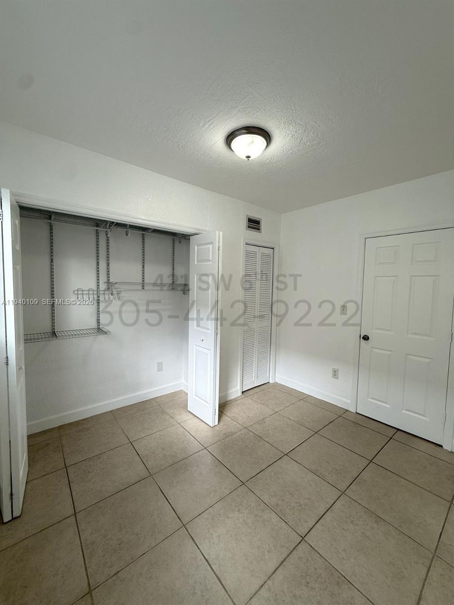 421 Southwest 6th Street, Unit 9 Miami, FL 33130 - Photo 7 of 9 a view of empty room