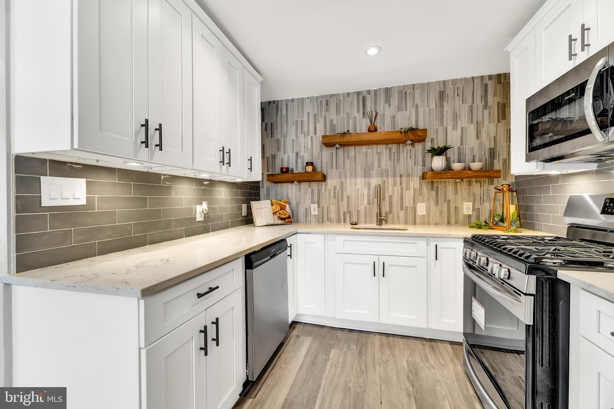 8150 Bullneck Road Dundalk, MD 21222 - Photo 2 of 27 Quartz Countertops & Cushion Close Cabinets
