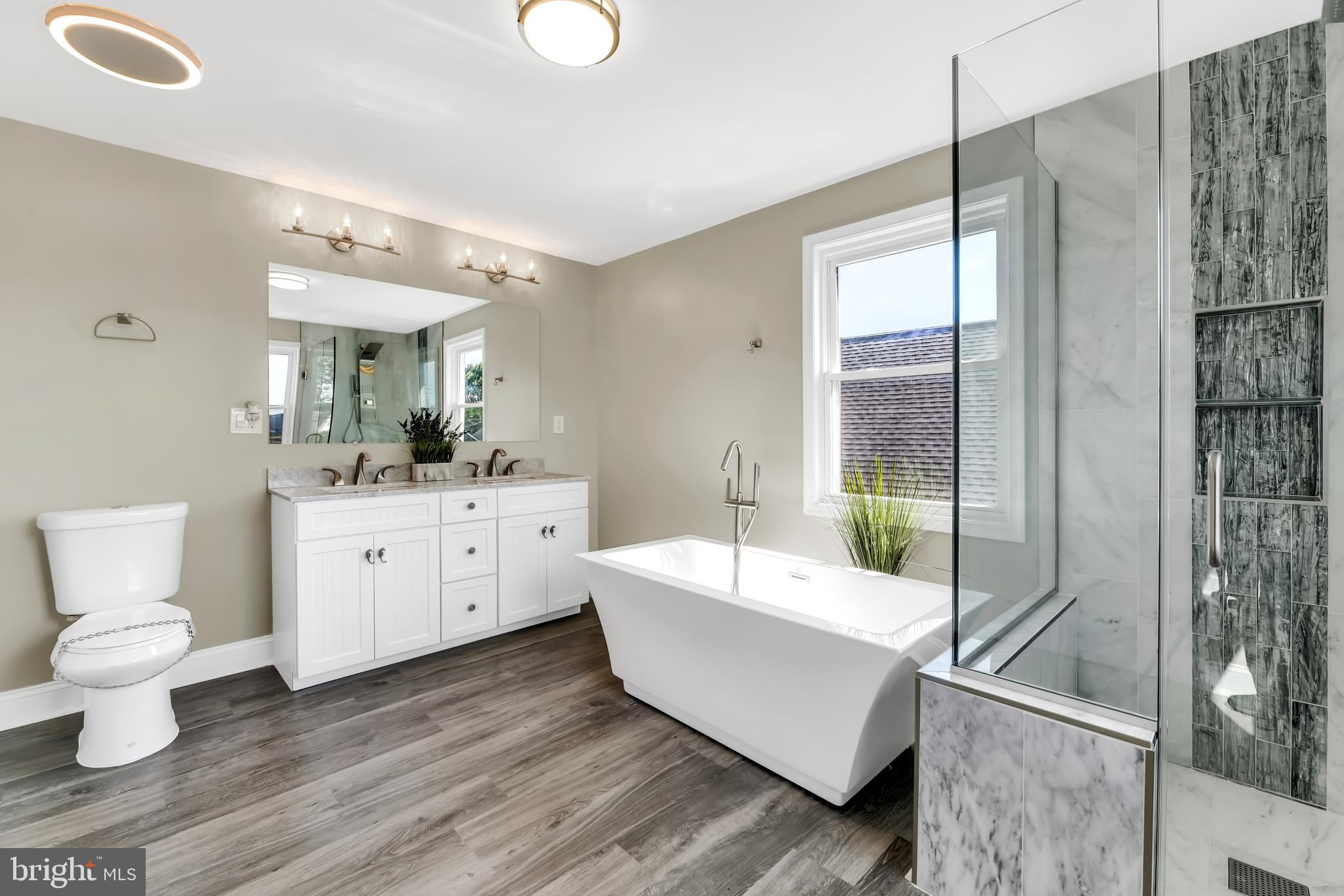 8150 Bullneck Road Dundalk, MD 21222 - Photo 20 of 27 Soaking Tub , Marble Shower & Hidden Laundry