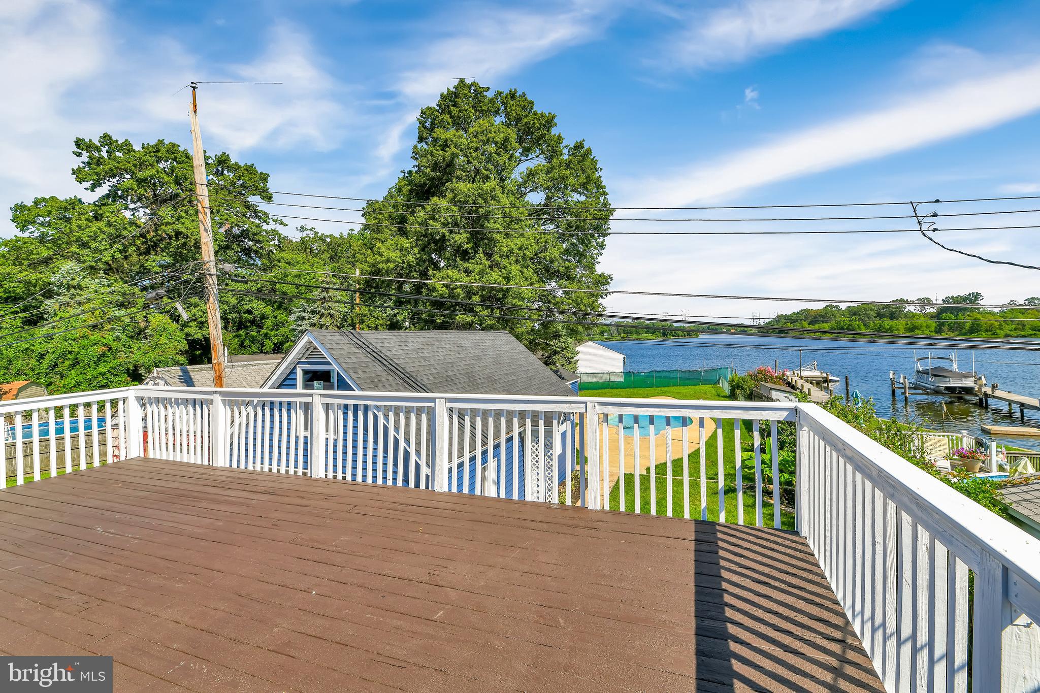 8150 Bullneck Road Dundalk, MD 21222 - Photo 22 of 27 Oversized Upstairs Deck is Outdoor Living Space