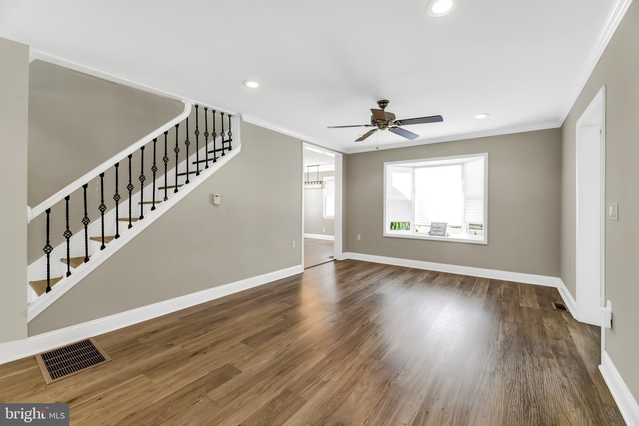 8150 Bullneck Road Dundalk, MD 21222 - Photo 7 of 27 Decorative Balusters frame the Open Staircase