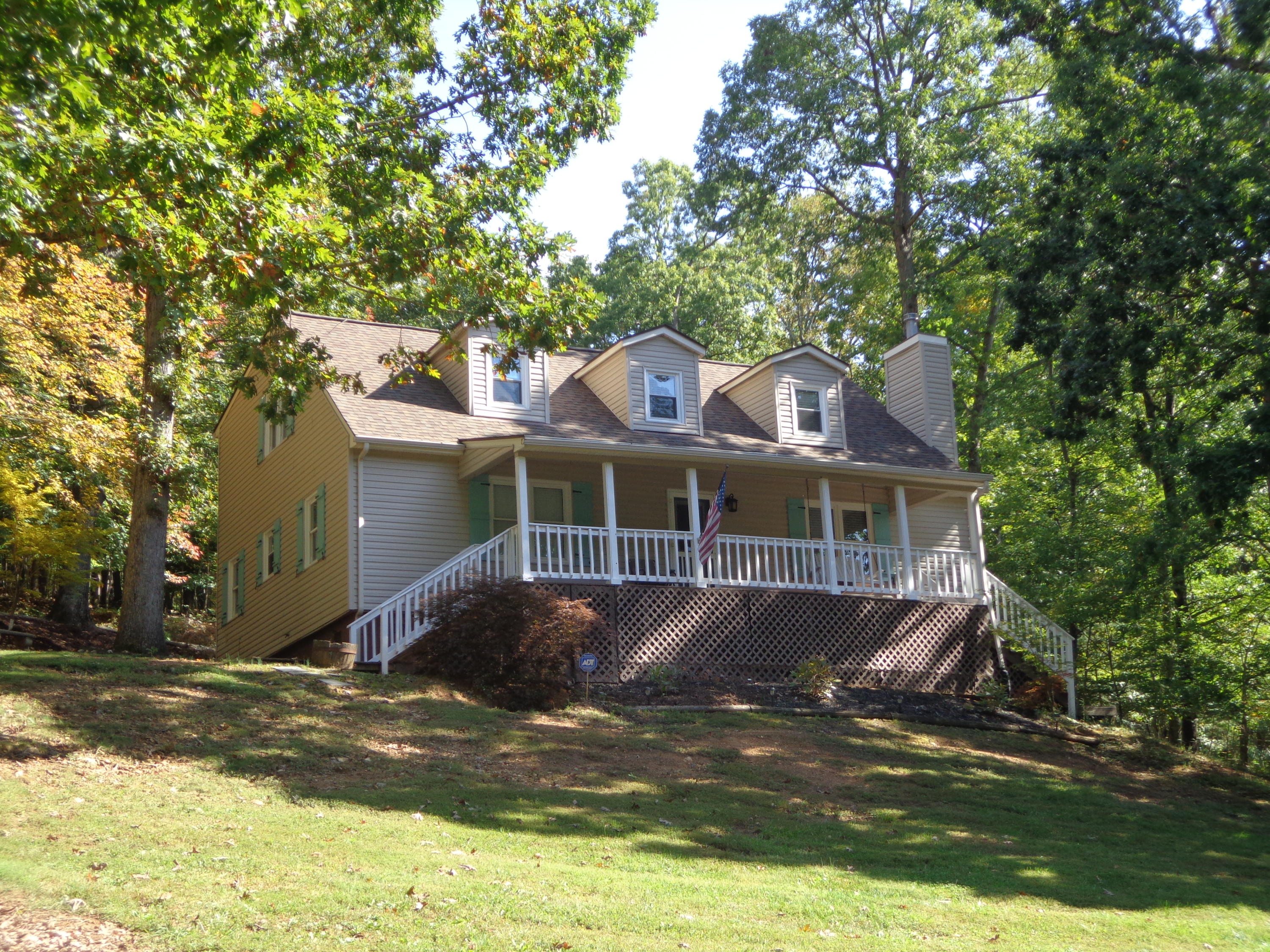 772 Skyview Road Salem, VA 24153 - Photo 1 of 41 a front view of a house with a garden