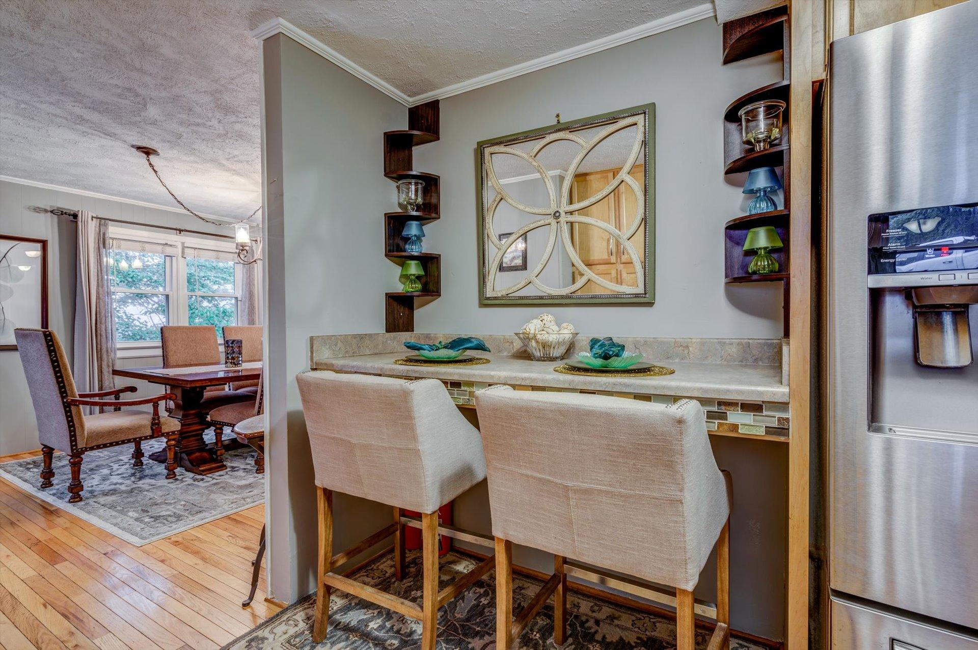 772 Skyview Road Salem, VA 24153 - Photo 12 of 41 a living room with granite countertop furniture and a dining table
