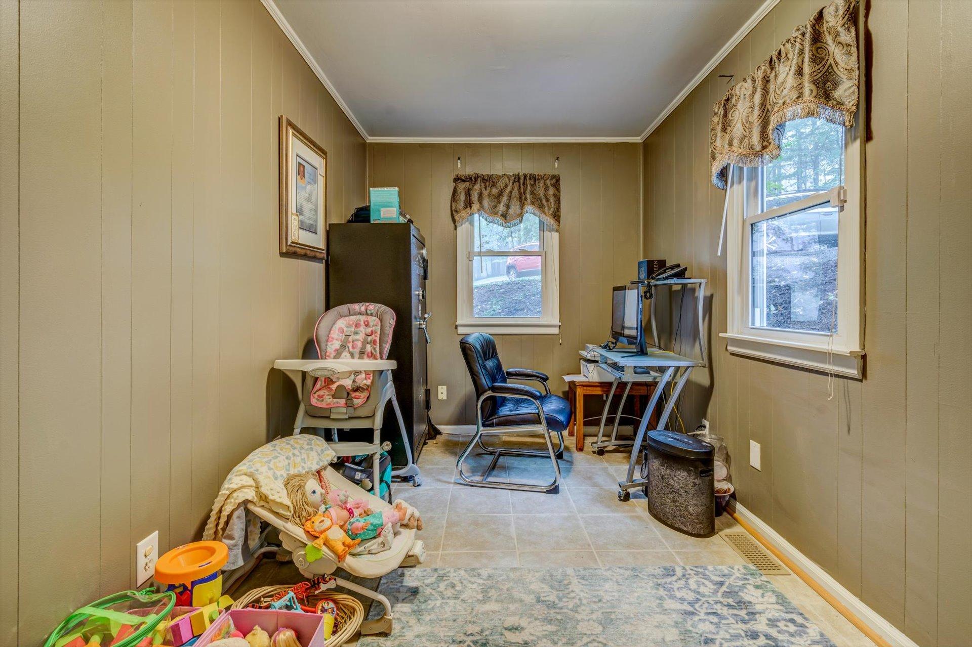 772 Skyview Road Salem, VA 24153 - Photo 16 of 41 a living room with furniture and a window