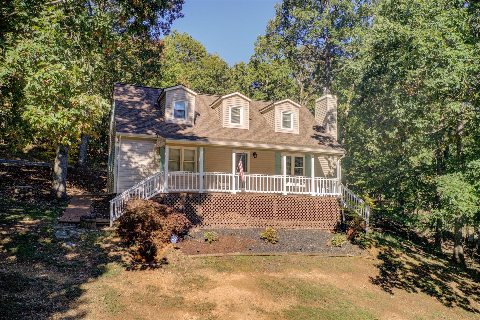 772 Skyview Road Salem, VA 24153 - Photo 3 of 41 a front view of a house with a garden