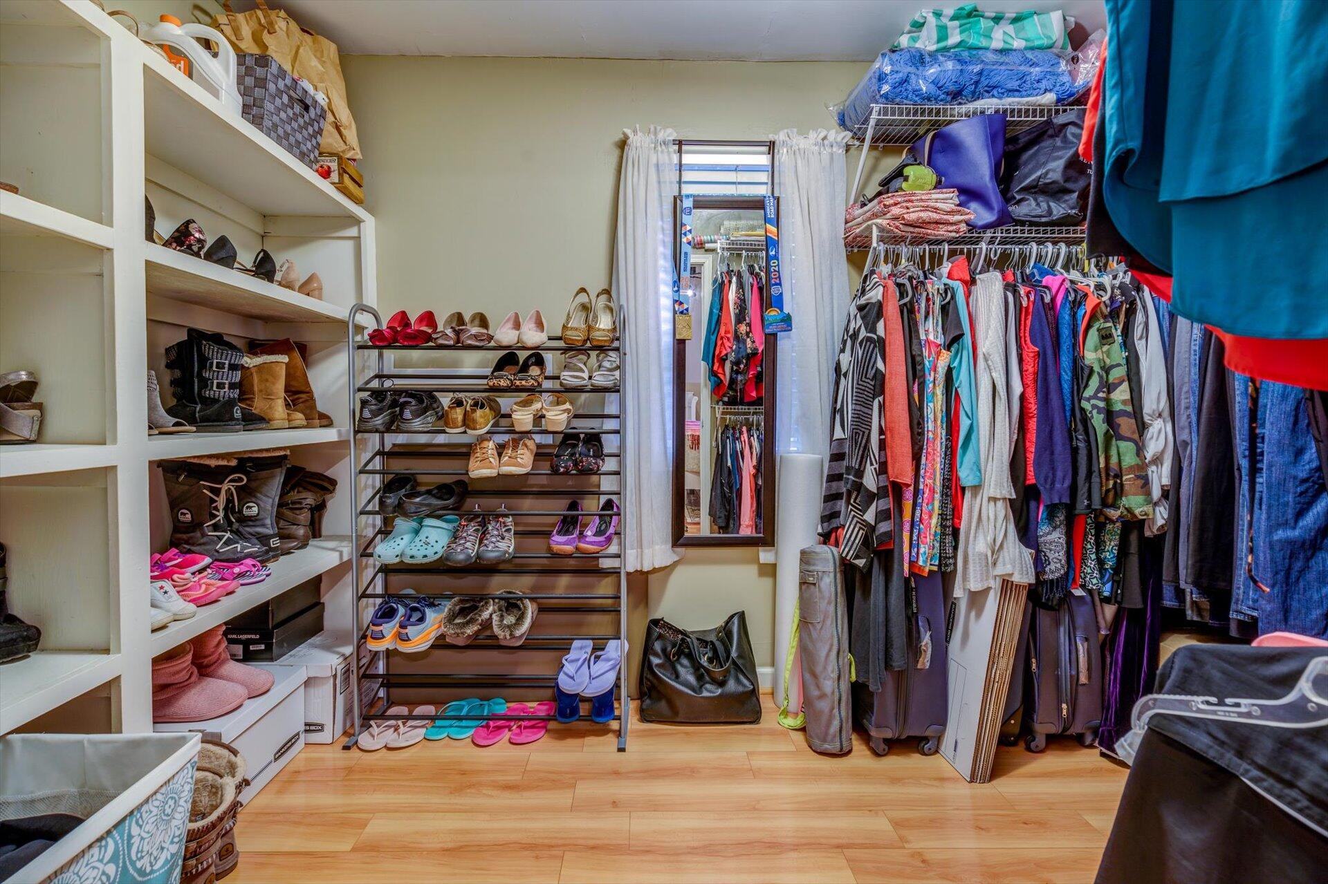 772 Skyview Road Salem, VA 24153 - Photo 23 of 41 a view of walk in closet with clothes and shoes