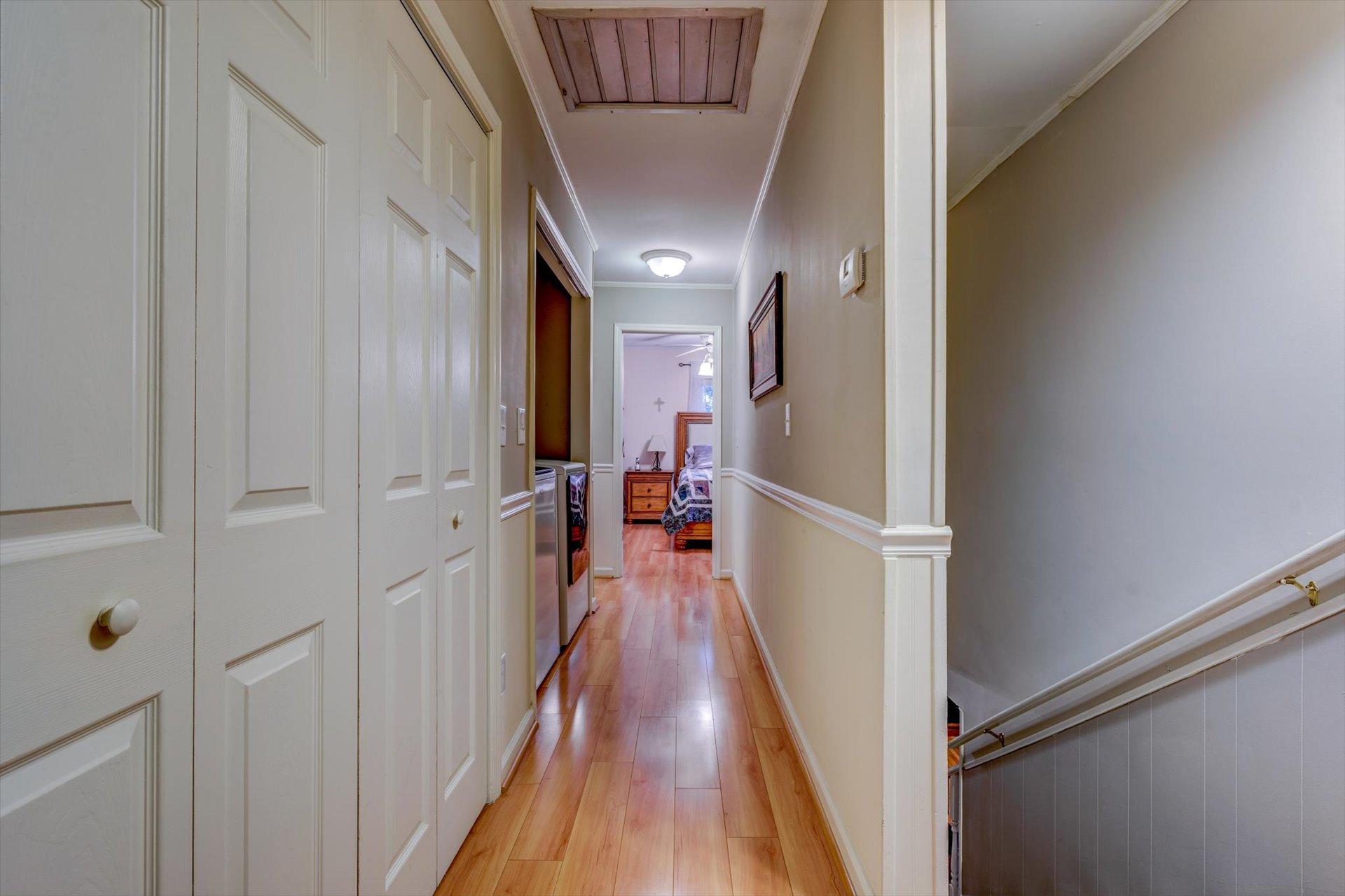 772 Skyview Road Salem, VA 24153 - Photo 24 of 41 a view of a hallway with wooden floor and staircase