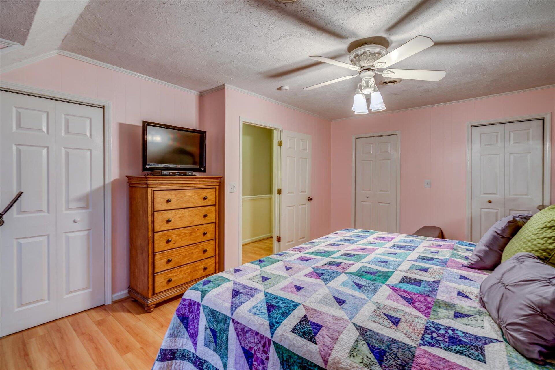 772 Skyview Road Salem, VA 24153 - Photo 26 of 41 a bedroom with a bed and a flat screen tv