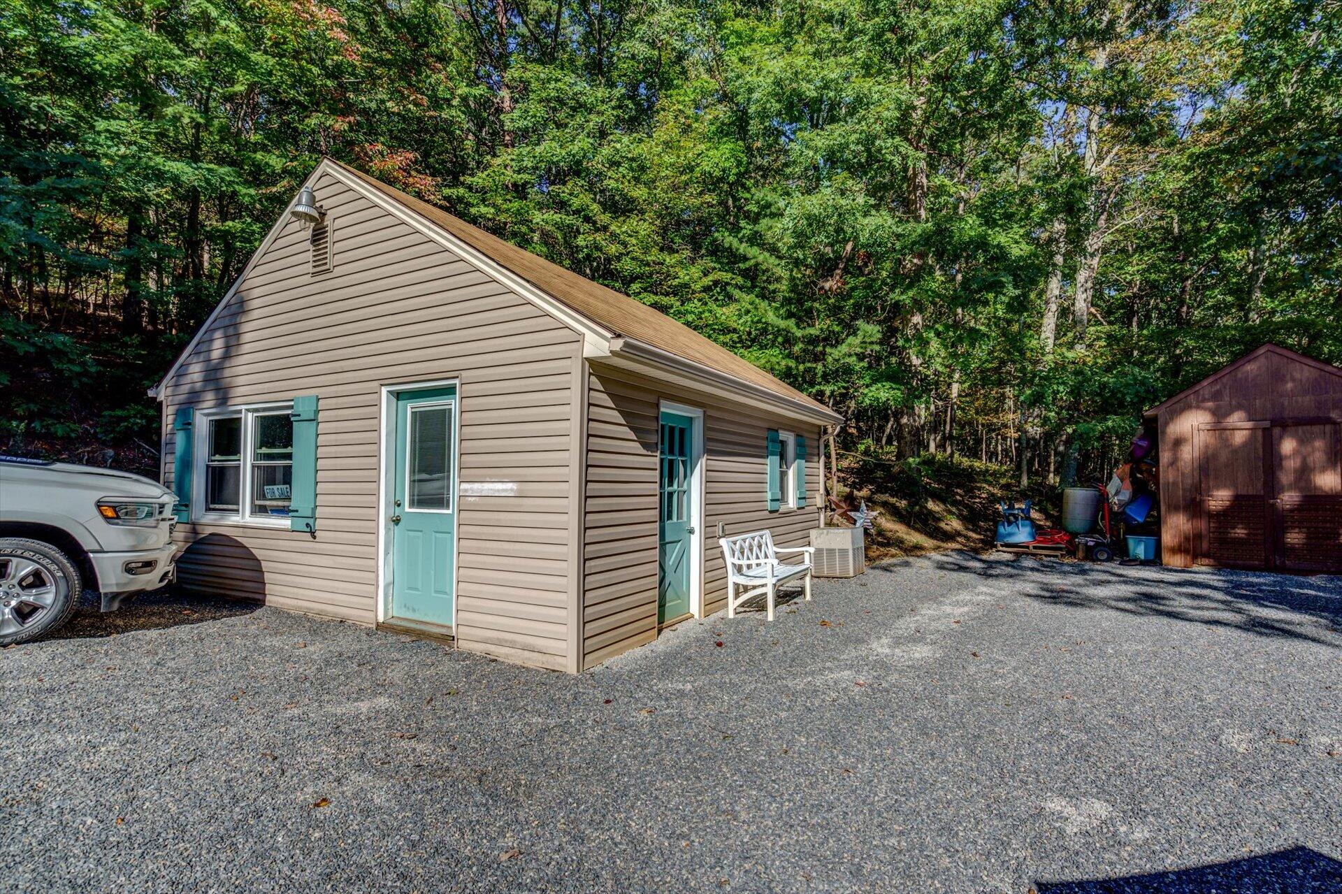 772 Skyview Road Salem, VA 24153 - Photo 29 of 41 a view of a house with a yard and parking space