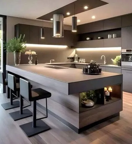 a kitchen with a table and chairs