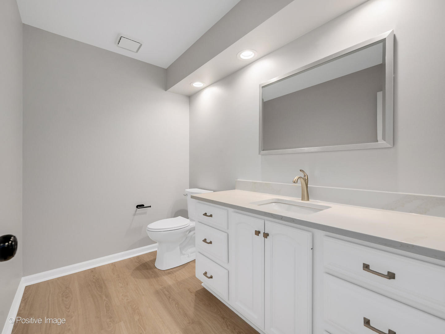 805 Potomac Avenue Naperville, IL 60565 - Photo 16 of 38 a bathroom with a toilet sink and mirror