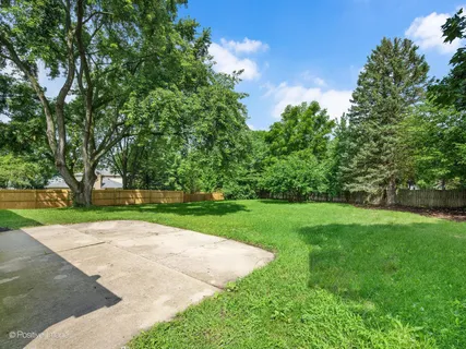 a view of backyard with green space
