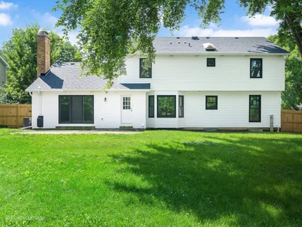 a view of a house with a garden