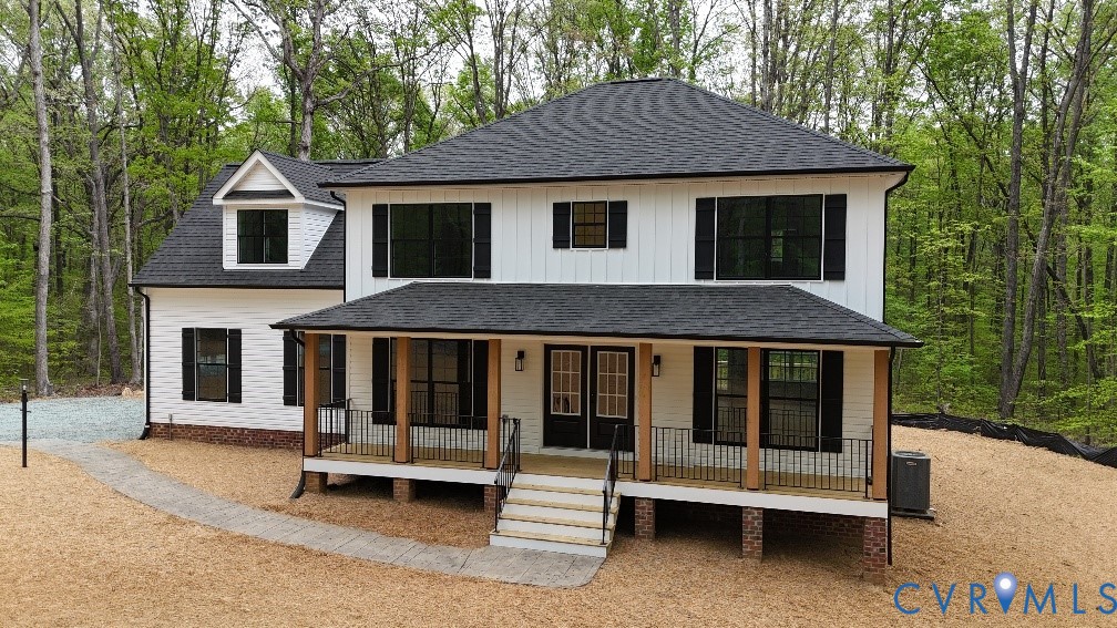 1749 Hollands Road Palmyra, VA 22963 - Photo 1 of 40 Modern farmhouse with a porch, roof with shingles,