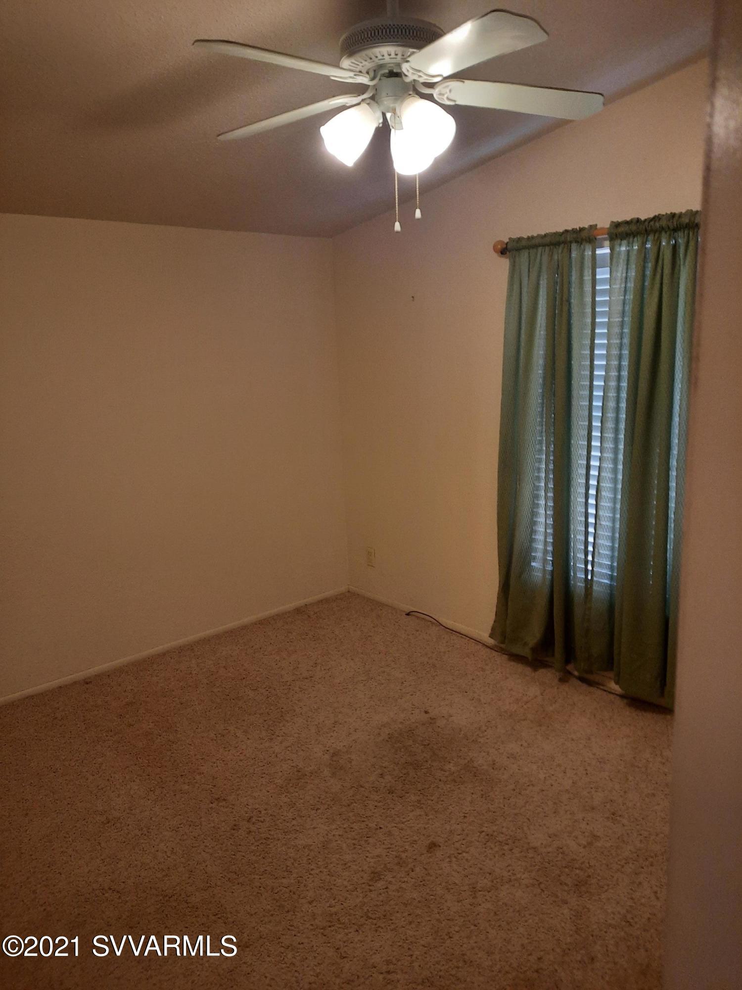 3965 Beaver Lane Rimrock, AZ 86335 - Photo 6 of 10 a view of an empty room with a window