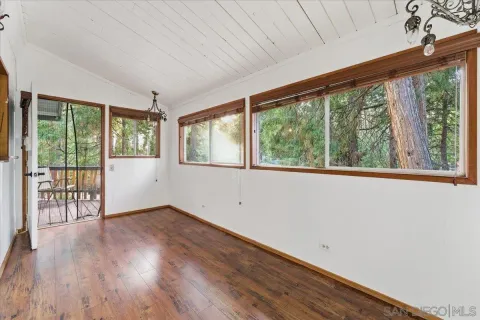 a view of a balcony with furniture