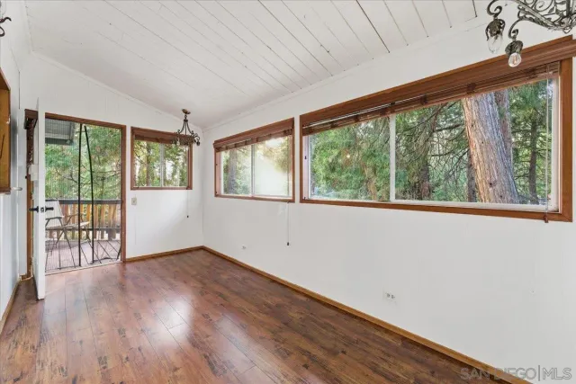 a view of a balcony with furniture