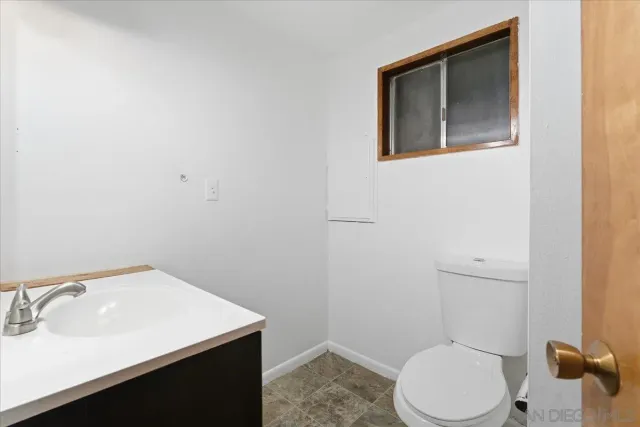 a view of a room that has a window