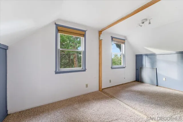 a view of empty room with front door