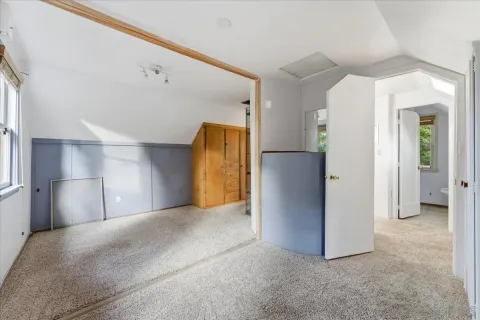 a view of a room with an entryway