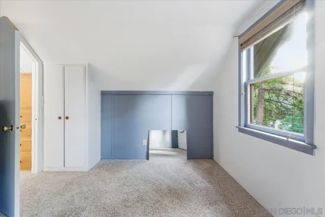 a bathroom with a sink and a window