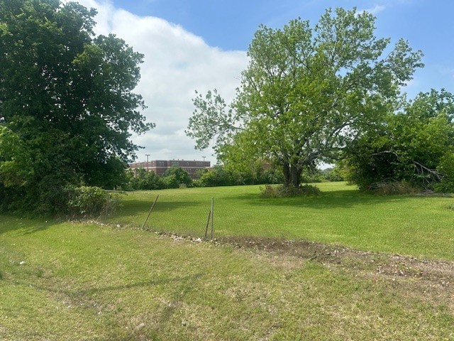 a view of a golf course with a lake