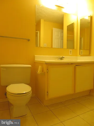 a bathroom with a toilet and a sink