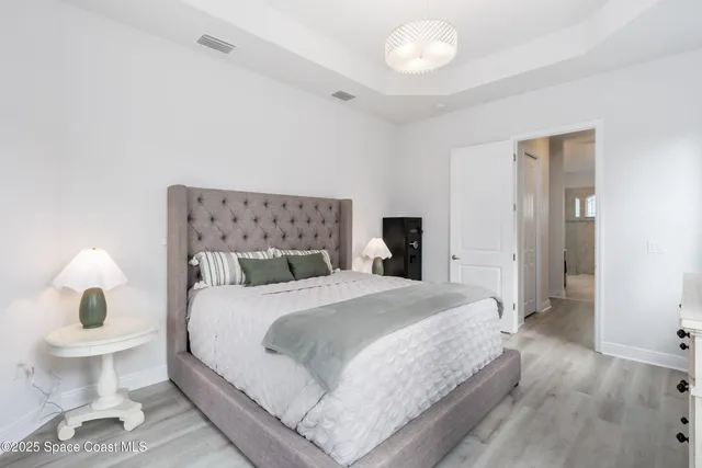 a bathroom with a toilet a sink and a shower