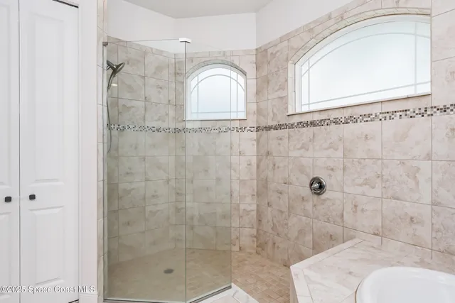 a utility room with sink dryer and washer