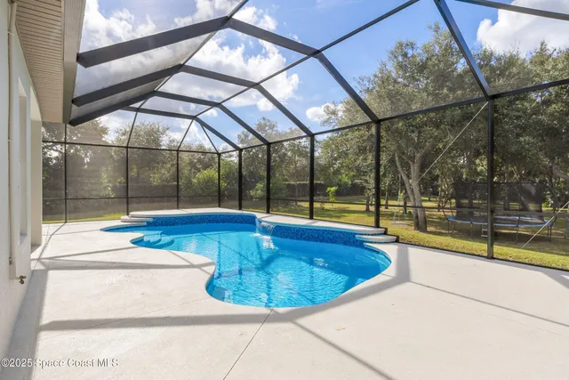 a view of a house with a big yard
