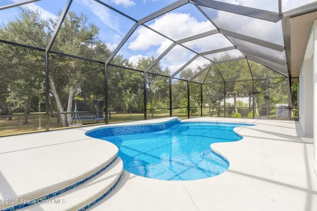 a view of a park with swings