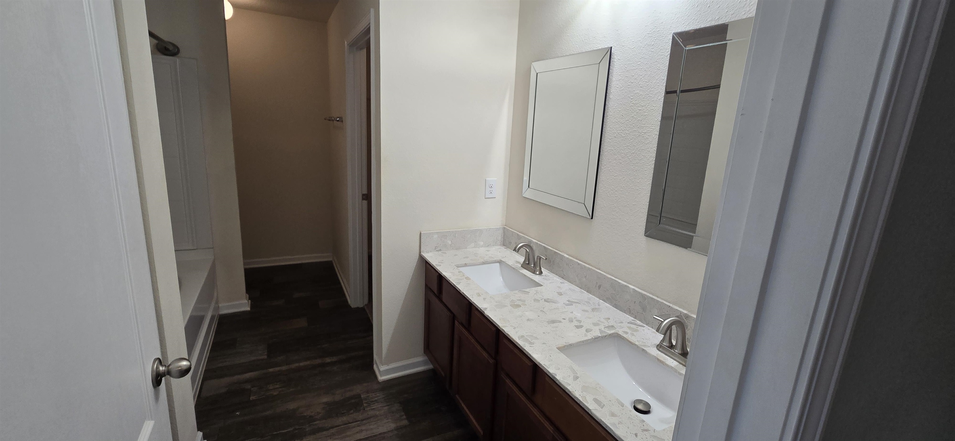 194 Ashby Lndg Way St. Augustine, FL 32086 - Photo 6 of 12 a bathroom with a granite countertop sink and a mirror